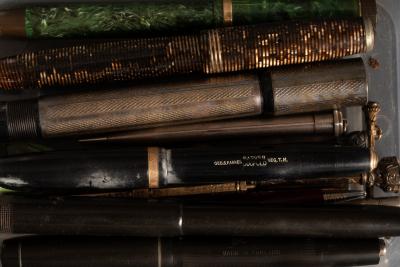 A quantity of pens and propelling