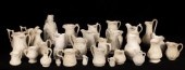 A quantity of saltware jugs, v