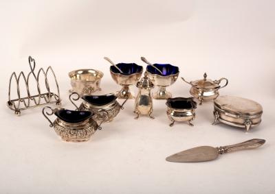 A quantity of silver cruets, a