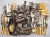 A quantity of silver plate fis