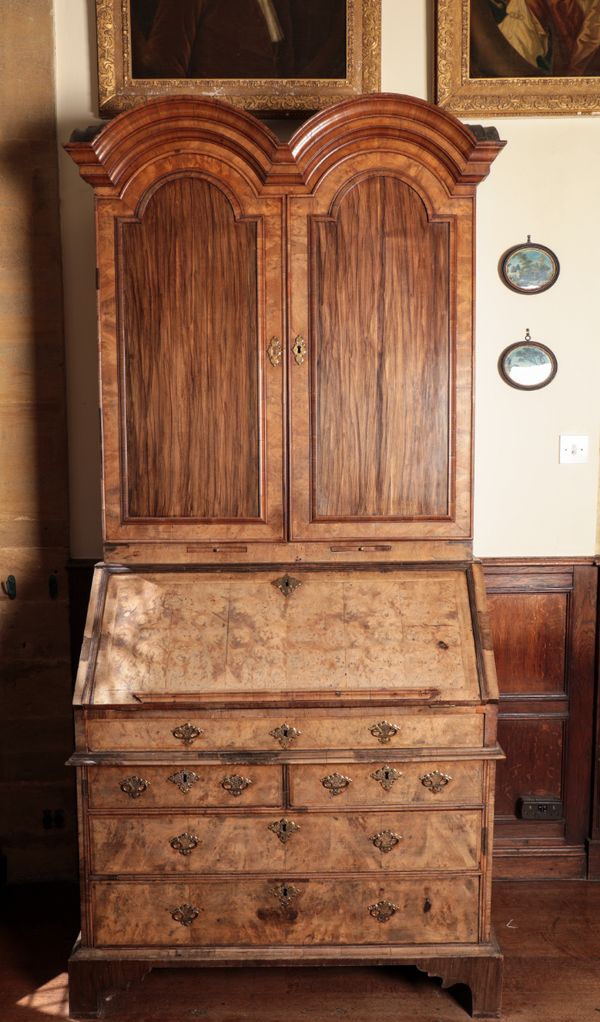 A QUEEN ANNE DOUBLE-DOMED WALNUT