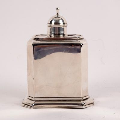 A Queen Anne style silver tea