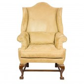 A QUEEN ANNE STYLE UPHOLSTERED