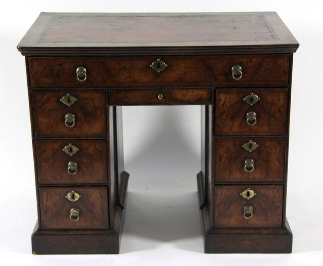 A Queen Anne walnut kneehole desk