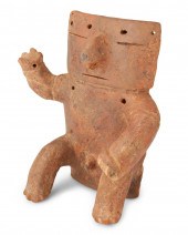 A QUIMBAYA CERAMIC SEATED FIGU