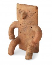 A QUIMBAYA CERAMIC SEATED FIGU