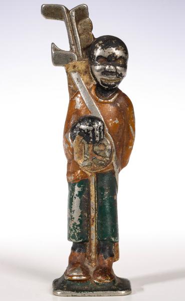 A RARE 1932 FIGURAL BLACK GOLF