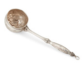 A RARE AMERICAN REPOUSSE COIN