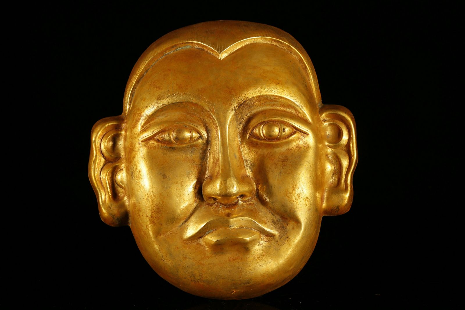 A RARE AND FINE GILT-BRONZE