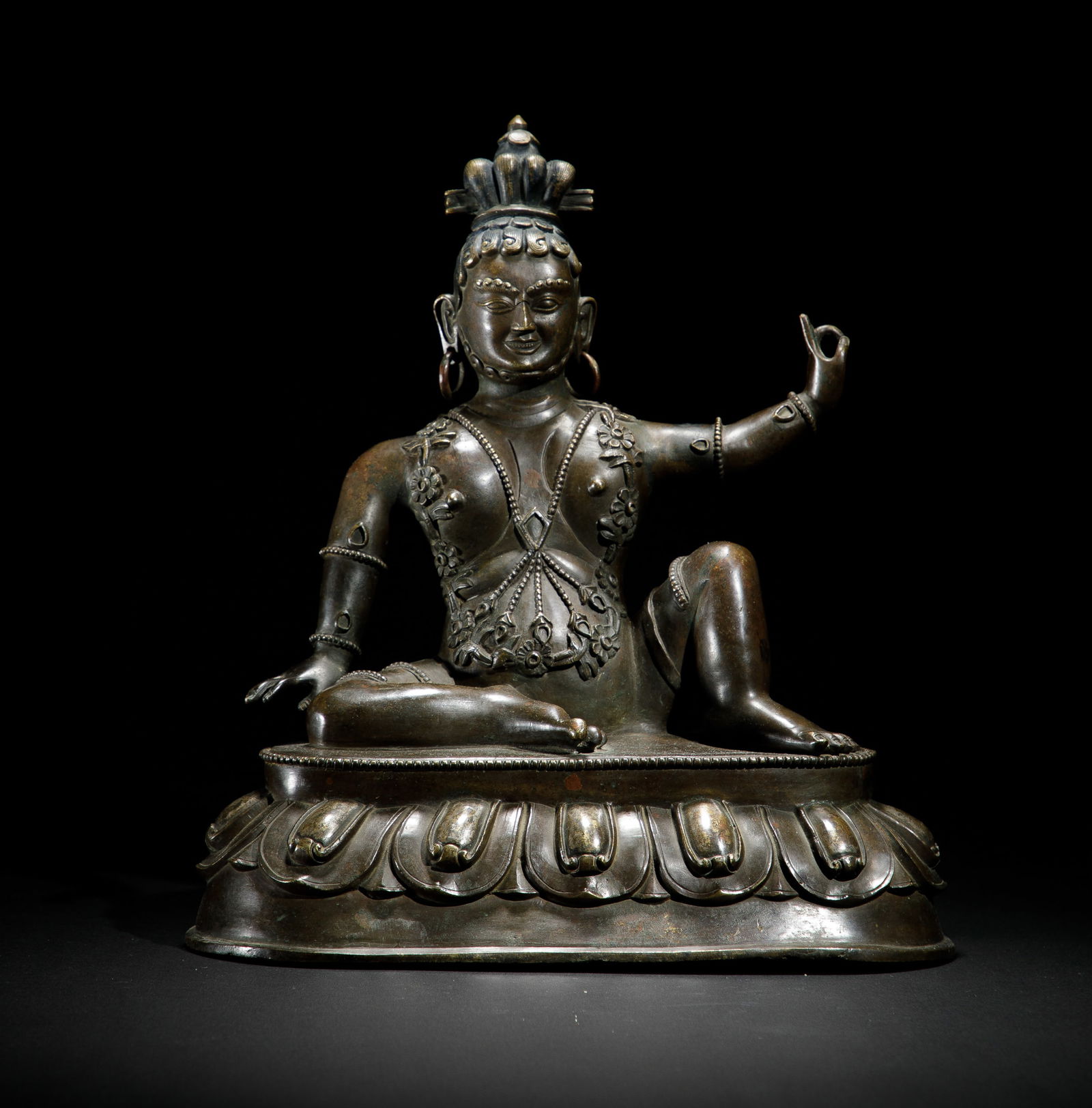 A RARE BRONZE FIGURE OF LAMAA