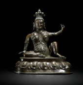 A RARE BRONZE FIGURE OF LAMA<b