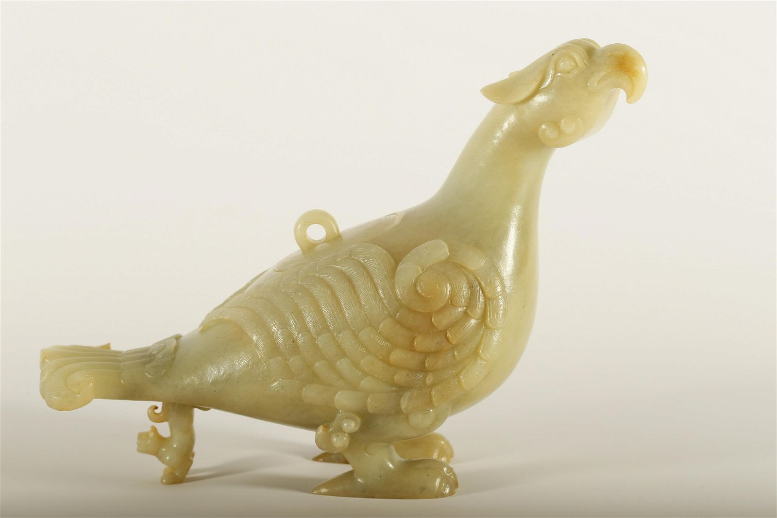 A RARE CELADON AND WHITE JADE