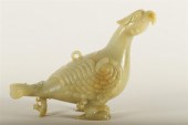 A RARE CELADON AND WHITE JADE