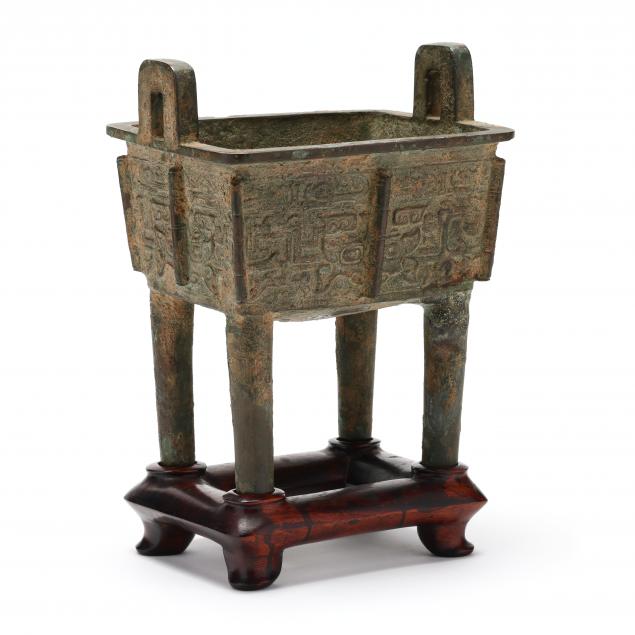 A RARE CHINESE BRONZE FANG DING