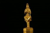 A RARE GILT-BRONZE FIGURE OF G