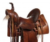 A RARE HIGH BACK SADDLE STAMPE