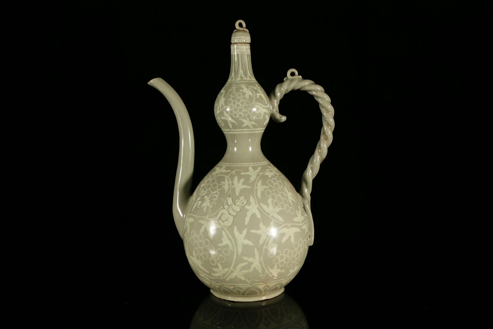A RARE KOREAN CELADON-GLAZED 'BOYS'