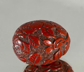 A RARE TSUISHU LACQUER NETSUKE