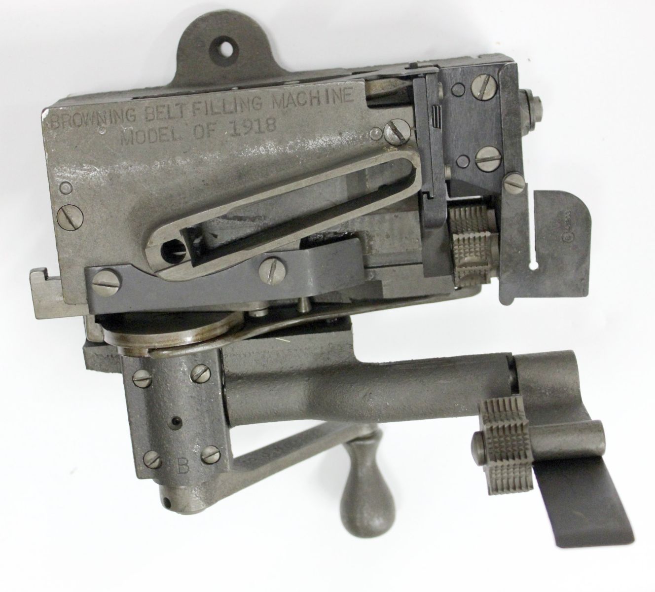 A RARE WWI BROWNING BELT FILLING