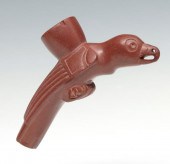 A RAVEN EFFIGY CARVED CATLINIT