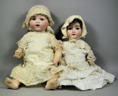 A Recknagel bisque headed doll