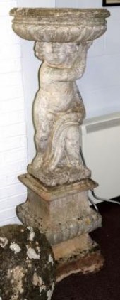 A reconstituted garden vase wi