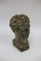 A reconstituted stone bust of