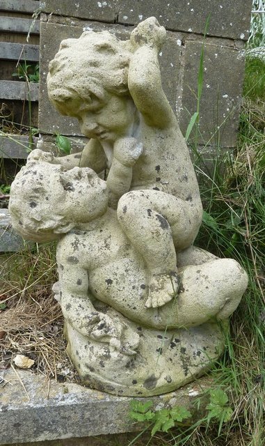 A reconstituted stone figure of