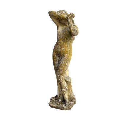 A reconstituted stone figure of a
