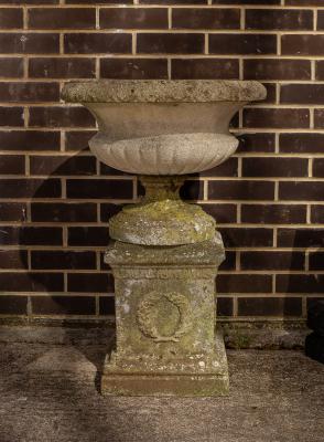 A reconstituted stone garden vase