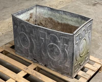 A rectangular lead garden cistern