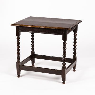 A rectangular oak table with
