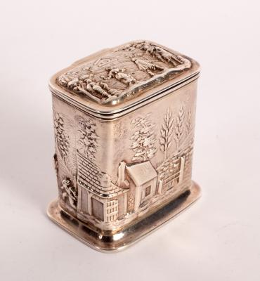 A rectangular silver tea caddy,