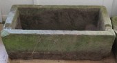 A rectangular stone trough 97c