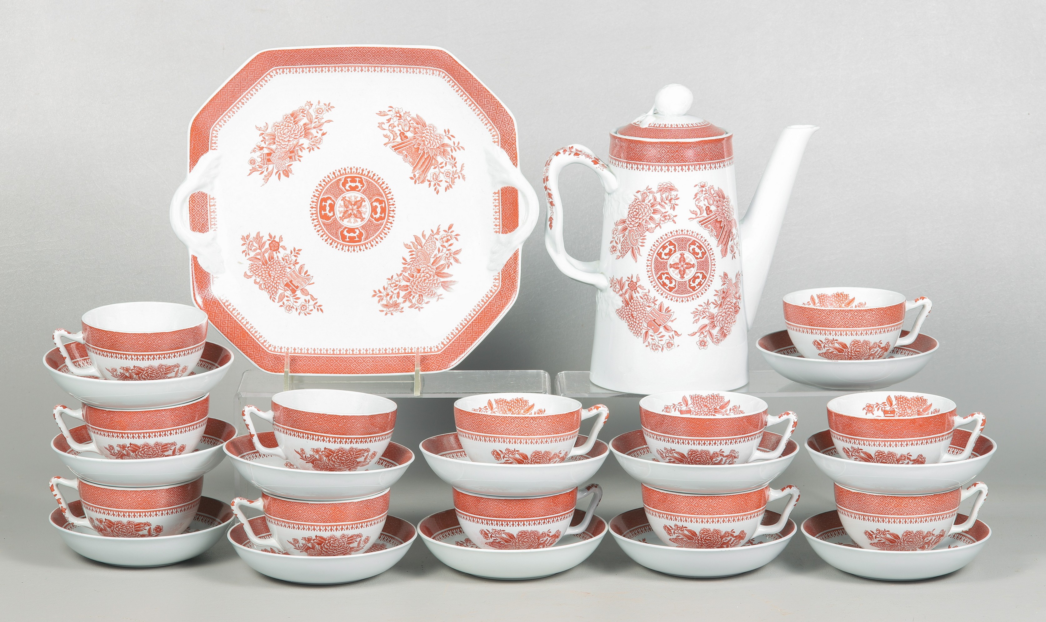 A red and white coffee set by