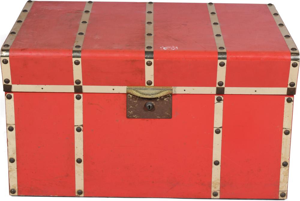A RED BRASS BOUND TRUNKA MODERN RED