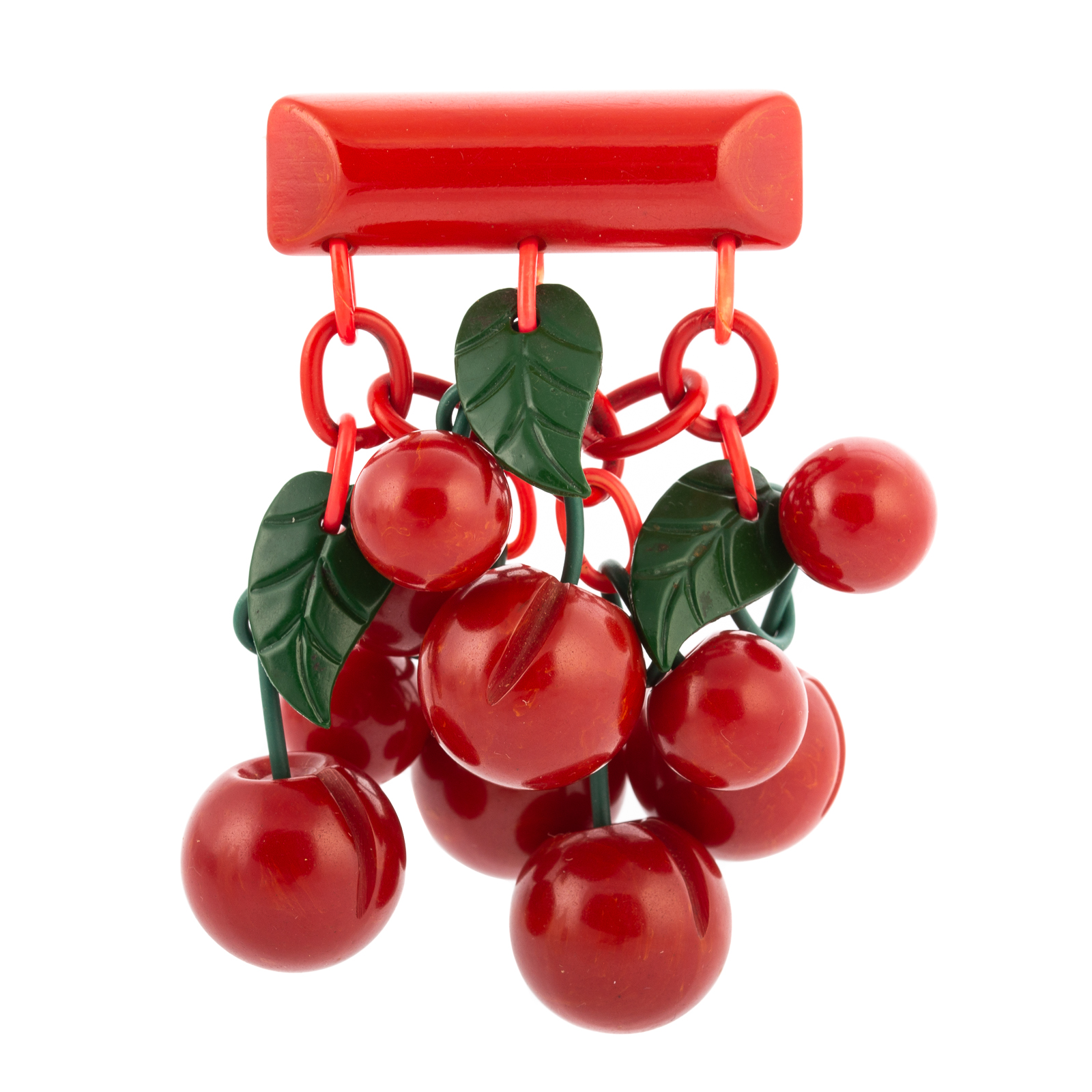A RED CHERRY BAKELITE PIN