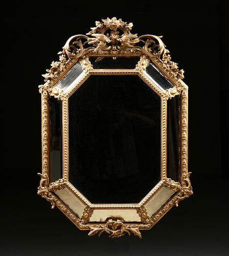 A REGENCE STYLE PARCEL GILT AND