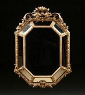 A REGENCE STYLE PARCEL GILT AN