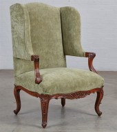 A REGENCE STYLE WALNUT FAUTEUI