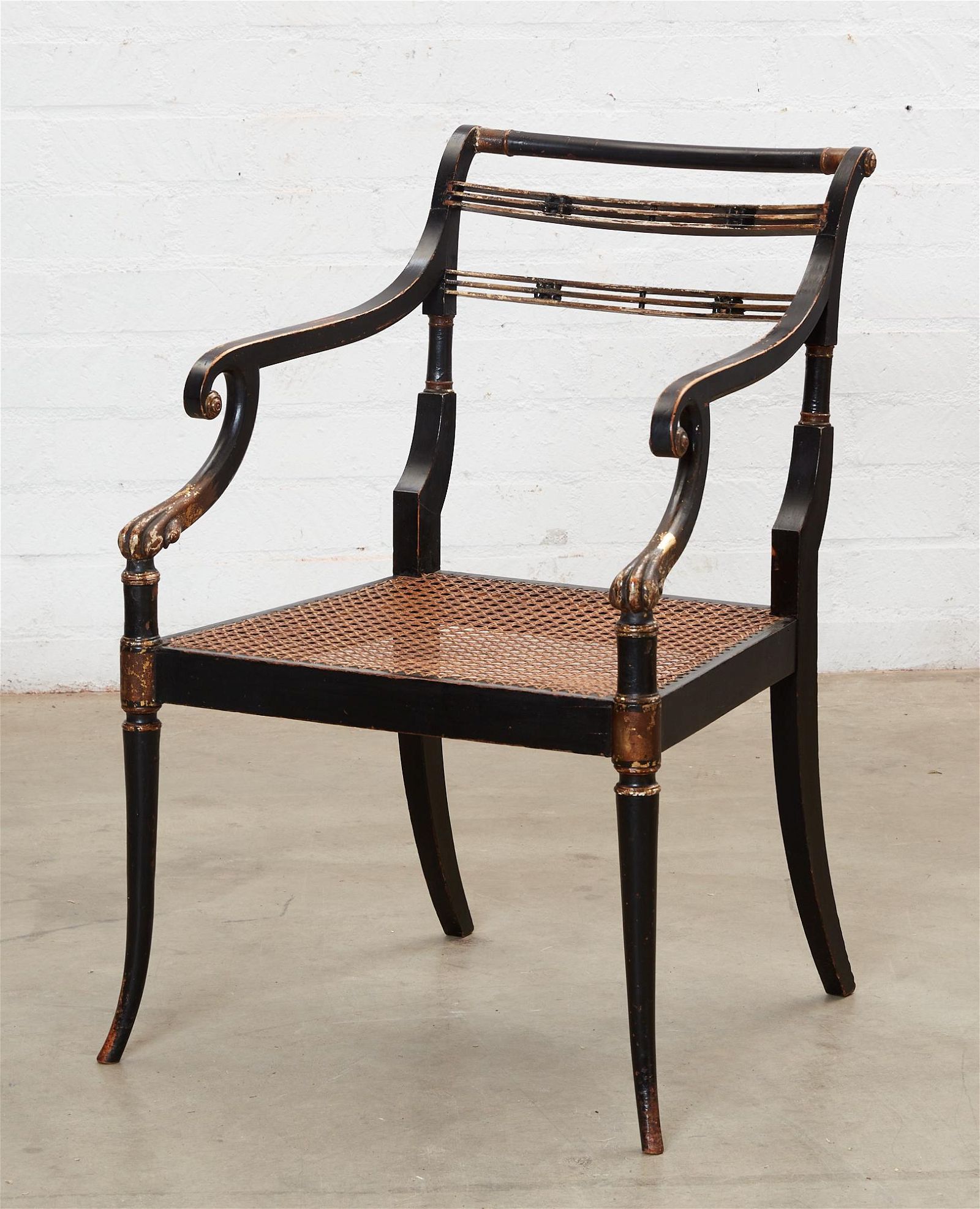 A REGENCY BLACK PAINTED AND