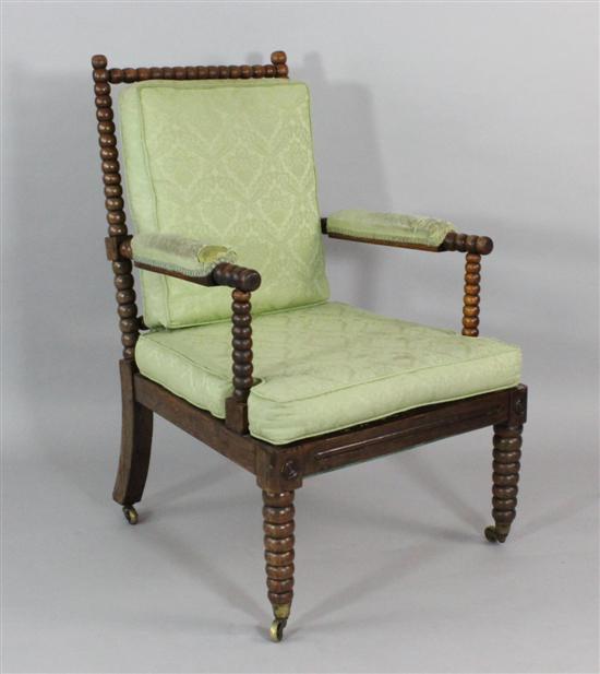 A Regency bobbin turned stained oak