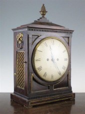 A Regency brass inset mahogany