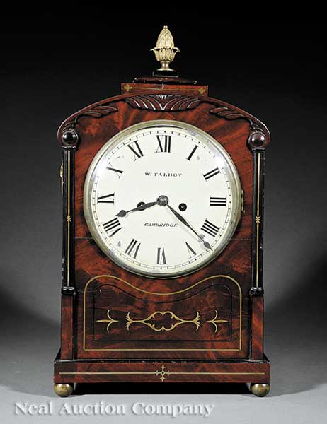 A Regency Carved Mahogany and Brass