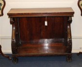 A Regency carved rosewood cons