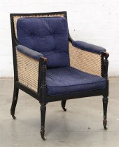 A REGENCY EBONIZED CANED BERGE