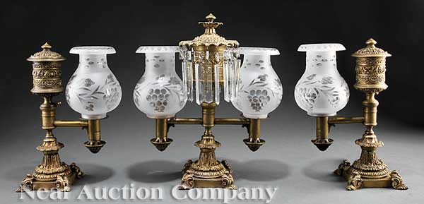 A Regency Gilt Bronze Three Piece