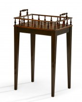 A REGENCY HARDWOOD BOOK TROUGH