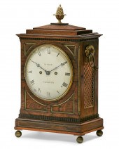 A REGENCY HARDWOOD TABLE CLOCK