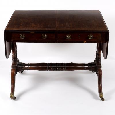 A Regency mahogany sofa table, on
